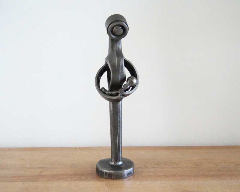 Motherhood metal sculpture