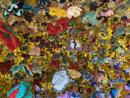Gabriela Drees-Hotz, Golden Noahâ€™s Ark Life-Saving Nest of the 21st Century, <br />Participatory art project with crocheted flowers and butterflies, 2023