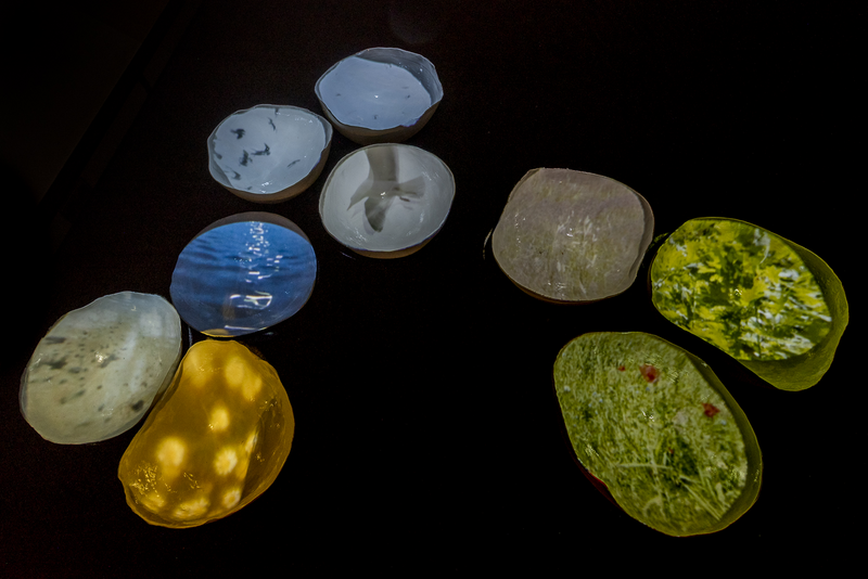 Thea van Vliet Monument Earth, porcelain bowls, projection, poem.jpg