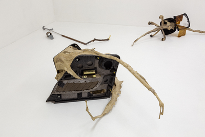 Ruta Putramentaite, Here All is Distance, There it was Breath, 2022. garbage, paper mache, kombucha leather, soil, sugar, bioplastic, flax seeds, wood, bones, various dimensions