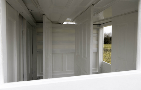 doors collected from homes, timber, brackets, aluminum rail, paint,