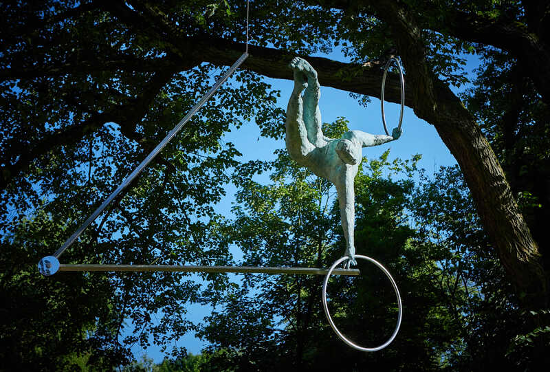 Acrobat on an Open Trapeze