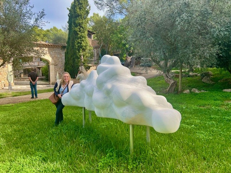 Laure Debouttierre with sculpture Cloud by Ien van Wierst at the Palmyra Sculpture Centre, Mallorca.