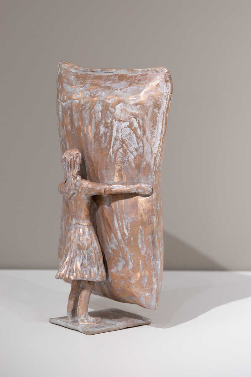 Kleine Bronzeskulptur Frau Holle