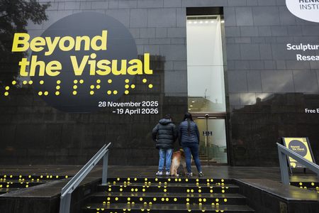 Two visitors and a Guide Dog walk into Henry Moore Institute. Photo Joanne Crawford