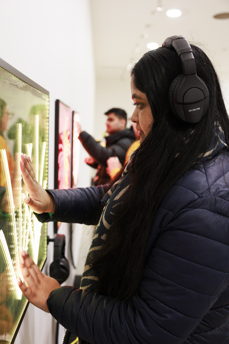 Visitors touching Collin van Uchelen Project Fire Flower 2021. Photo Joanne Crawford