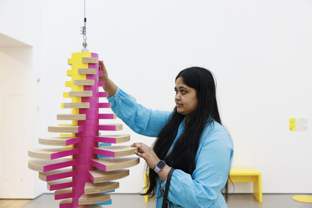 A visitor with Ken Wilder Pendulum 2025. Photo Joanne Crawford