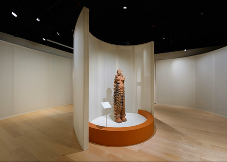 Seyni Awa Camara, Untitled, 2024. Terracotta sculpture, 192 x 48 x 38 cm from Expecting: Birth, Belief and Protection at Wellcome Collection. Courtesy of The Museum of Everything. Photo Steven Pocock