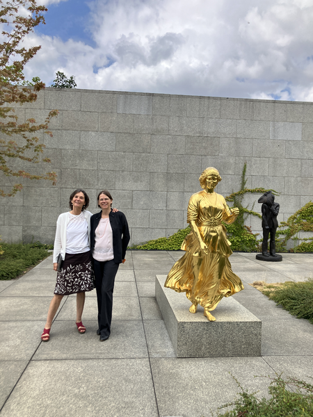 Curators Anne Berk & Anemone Vostell at Neue Nationalgalerie Sculpture Garden 2025, artwork Alicija Kwade: Berlinerin. Photo: Hartmut Stielow