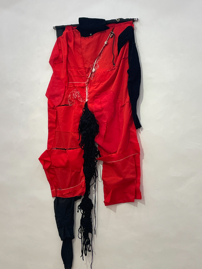 Mariuccia Secol, Frauenmord (eng. Femicide), 1988, patchwork of clothes and tights, 210 x 90 cm