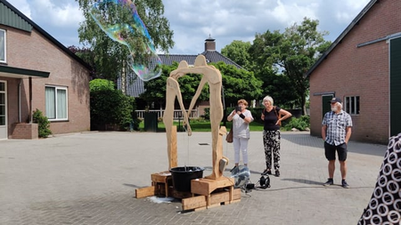 Kinetic sculpture making soap bubbles