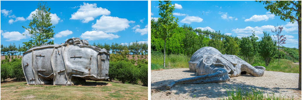 Rechts: Tom Claassen (1964, NL) "Hippomal", 2005, Polyester, Stahl;  Links: Kevin van Braak (1975, NL), "Elephant", 2015, Teakholz, ca. 850 x 350 x 140 cm